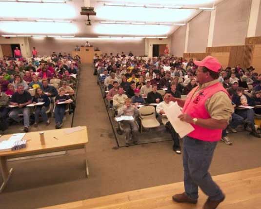Instructor teaching a hunters education class. 